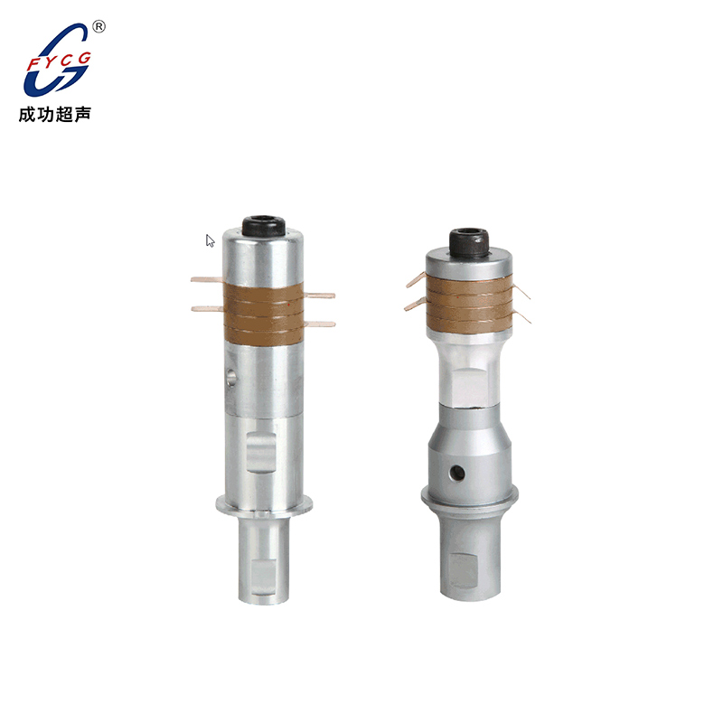 Ultrasonic welding transducer with booster